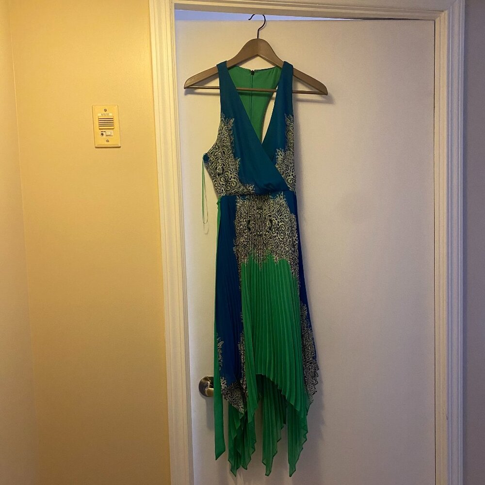 Lovely asymmetrical-hem, pleated, dress from Max & Cleo. 100% polyester. Used.